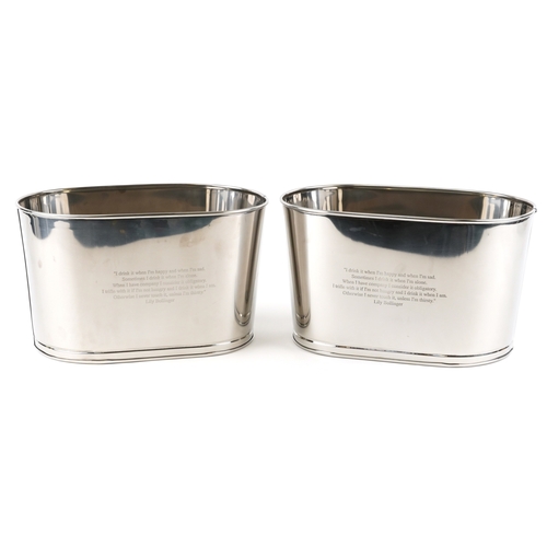 1012 - A pair of polished metal Champagne ice buckets with Napoleon Bonaparte and Lily Bollinger mottos, 26... 