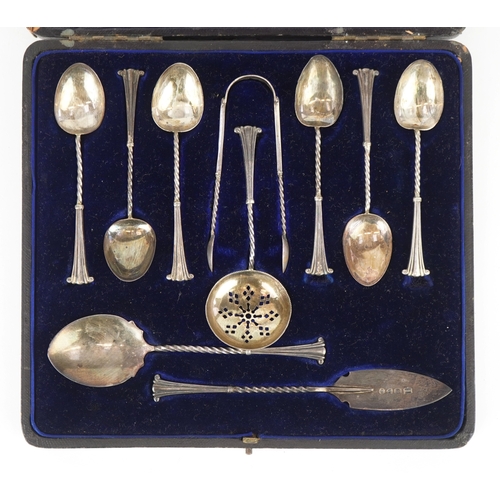 40 - D George Collins, a set of Victorian silver teaspoons and cutlery housed in a velvet and silk lined ... 