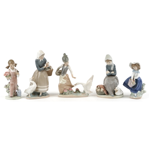 602 - Five Lladro porcelain figures including a seated girl with a goose and goslings 1267, a young girl w... 
