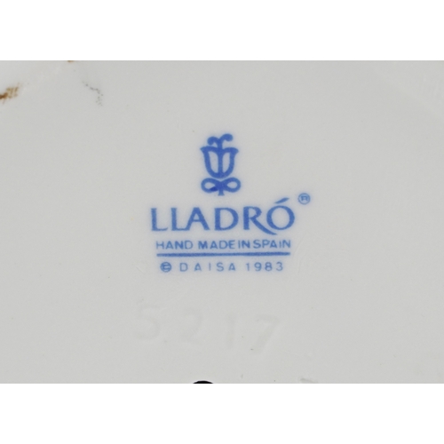 602 - Five Lladro porcelain figures including a seated girl with a goose and goslings 1267, a young girl w... 