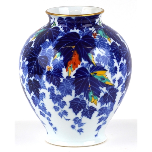 451 - A Japanese porcelain baluster vase decorated with leaves, bearing character marks to the base, 28cm ... 