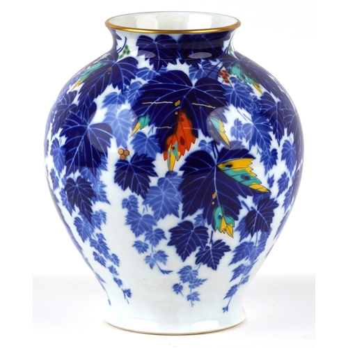 451 - A Japanese porcelain baluster vase decorated with leaves, bearing character marks to the base, 28cm ... 