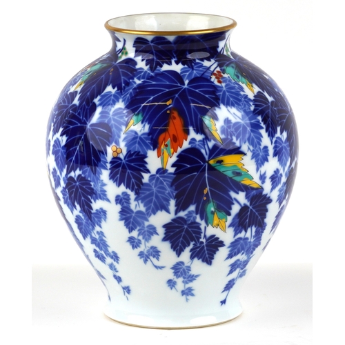 451 - A Japanese porcelain baluster vase decorated with leaves, bearing character marks to the base, 28cm ... 