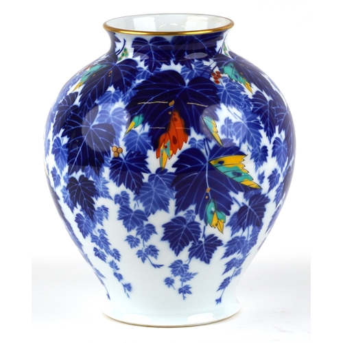 451 - A Japanese porcelain baluster vase decorated with leaves, bearing character marks to the base, 28cm ... 