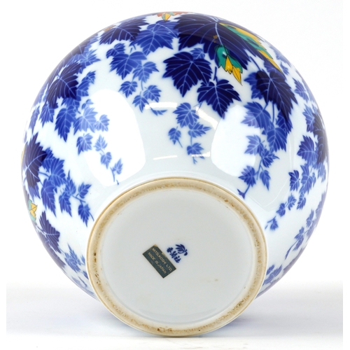 451 - A Japanese porcelain baluster vase decorated with leaves, bearing character marks to the base, 28cm ... 