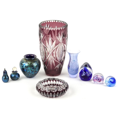 436 - Three pieces of Isle of Wight glass comprising a vase, scent bottle with stopper and a paperweight t... 