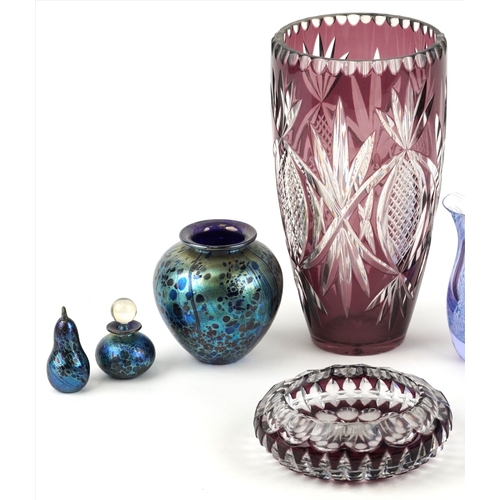 436 - Three pieces of Isle of Wight glass comprising a vase, scent bottle with stopper and a paperweight t... 