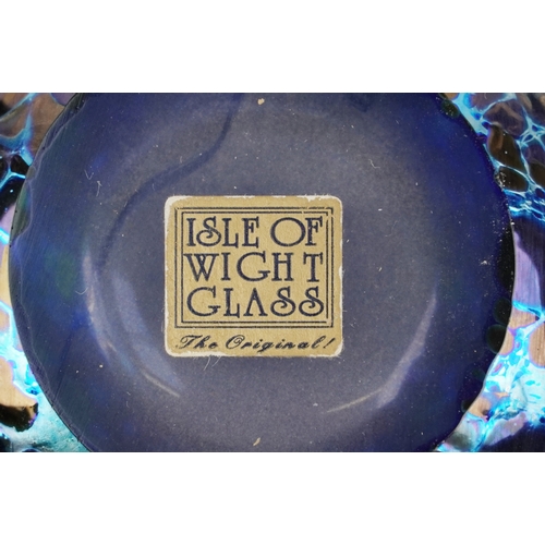 436 - Three pieces of Isle of Wight glass comprising a vase, scent bottle with stopper and a paperweight t... 