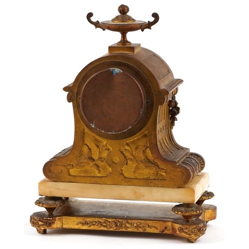 126 - A 19th century ormolu and white marble mantle clock with Sèvres style porcelain panels, the circular... 