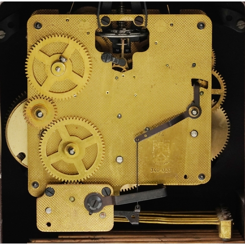  A late 20th century Louis XVI style walnut veneered and gilt metal mounted mantle clock with cherub ... 