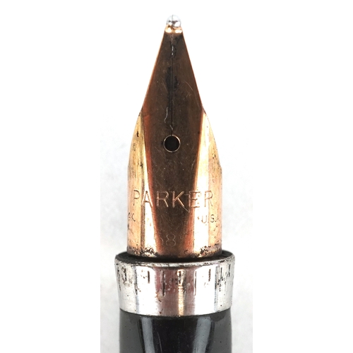 64 - Parker, a sterling silver engine turned fountain pen with 14K gold nib, 13cm in length.