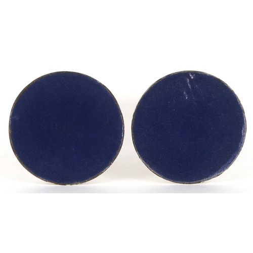 45 - A pair of 830 grade Cyprus silver candlesticks with embossed decoration, KAL maker's mark, 18.5cm hi... 