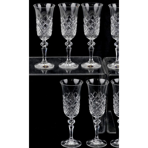 637 - A set of ten Bohemia Czechoslovakian cut crystal glasses, 20.5cm high.