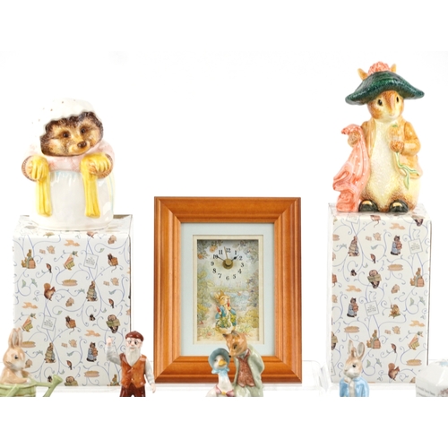 614 - Beatrix Potter collectables, mostly with boxes, including Wedgwood, Beswick and Royal Albert, the la... 