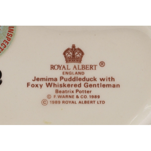 614 - Beatrix Potter collectables, mostly with boxes, including Wedgwood, Beswick and Royal Albert, the la... 