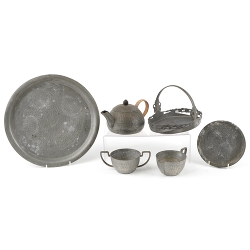 1559 - A small group of early 20th century pewter items including a teapot, salver, milk jug, sugar bowl di... 
