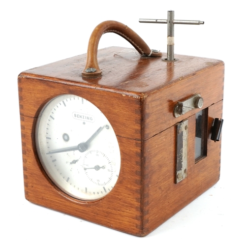  An early to mid 20th century oak cased Benzing pigeon clock supplied by B Leefe & Sons, the lid insc... 