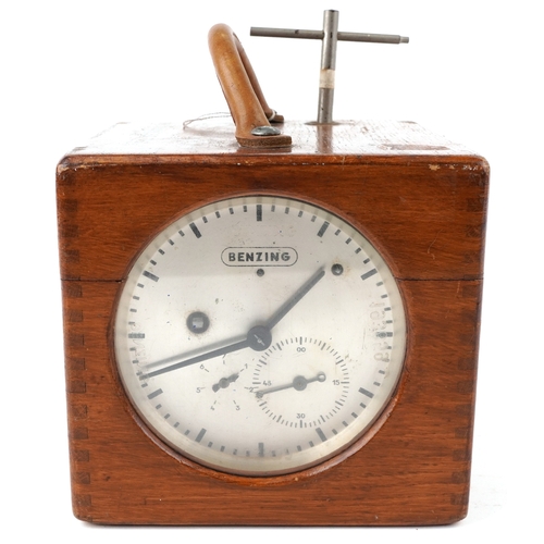 An early to mid 20th century oak cased Benzing pigeon clock supplied by B Leefe & Sons, the lid insc... 