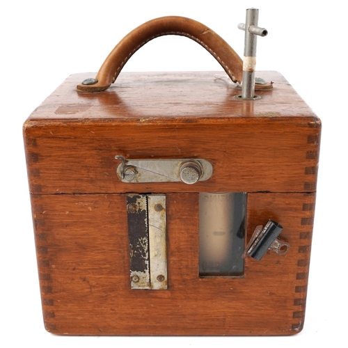  An early to mid 20th century oak cased Benzing pigeon clock supplied by B Leefe & Sons, the lid insc... 