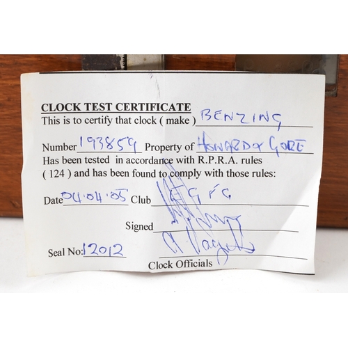  An early to mid 20th century oak cased Benzing pigeon clock supplied by B Leefe & Sons, the lid insc... 