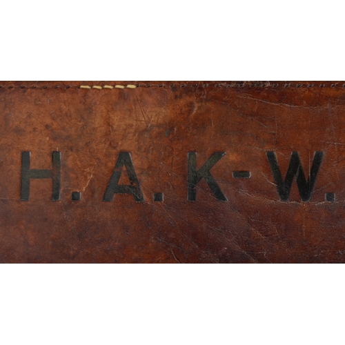 2839 - A military interest World War II brown leather leg of mutton gun case.