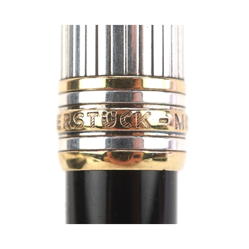 72 - Montblanc, a Montblanc Meisterstuck ballpoint pen with 925 silver and gold cap, with box and paperwo... 