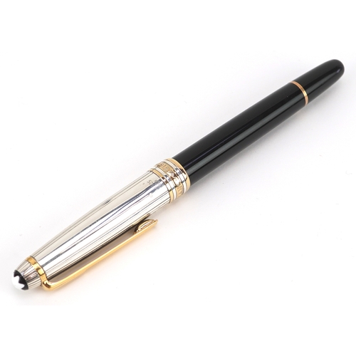 72 - Montblanc, a Montblanc Meisterstuck ballpoint pen with 925 silver and gold cap, with box and paperwo... 