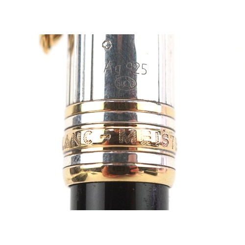 72 - Montblanc, a Montblanc Meisterstuck ballpoint pen with 925 silver and gold cap, with box and paperwo... 