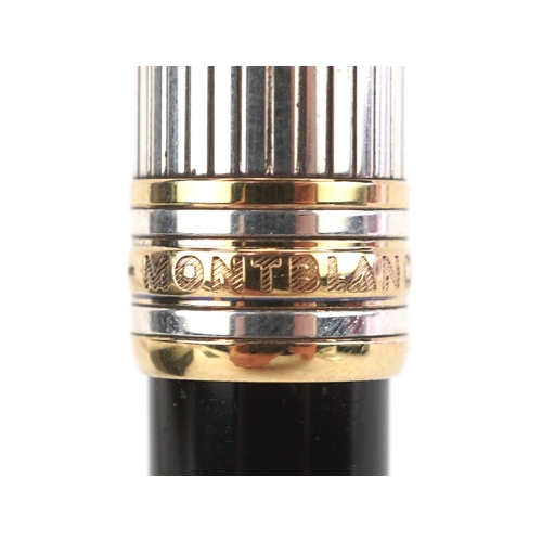 72 - Montblanc, a Montblanc Meisterstuck ballpoint pen with 925 silver and gold cap, with box and paperwo... 