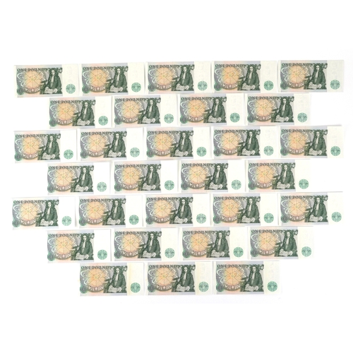 1187 - A run of thirty uncirculated 1980s one pound notes, serial numbers BY63 442867 - BY63 442896, Chief ... 