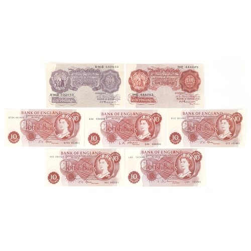 1183 - Vintage Bank of England ten shilling notes including a mauve seated Britannia with metal thread, Chi... 