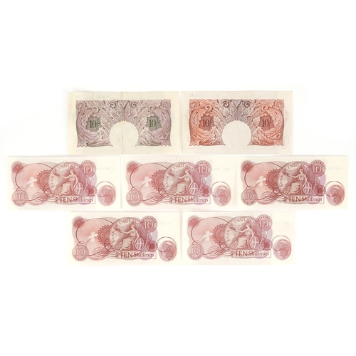 1183 - Vintage Bank of England ten shilling notes including a mauve seated Britannia with metal thread, Chi... 