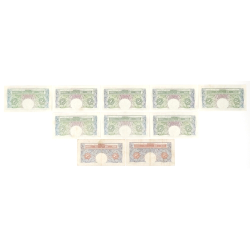 1182 - Two 1930s/40s blue seated Britannia one pound notes, Chief Cashier K. O. Peppiatt, serial numbers U5... 