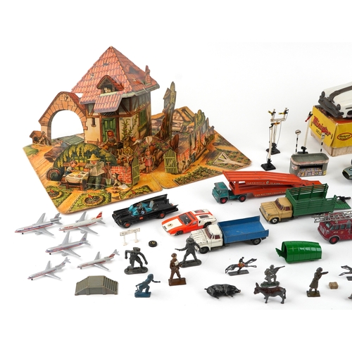 720 - Vintage toys including a Minister Deluxe tinplate car, Corgi diecast vehicles, lead figures and a po... 