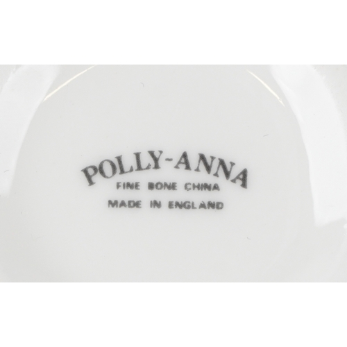 682 - Miniature collectable porcelain teaware including Wedgwood together with a diminutive mahogany dress... 