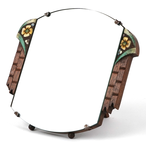 574 - An Art Deco oak easel mirror with bevelled glass and hand painted decoration, 28cm x 26cm.