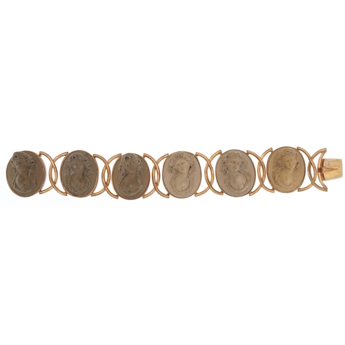 A 19th century gilt metal lava cameo panel bracelet, 18cm in length x 3cm wide, 51.6g.