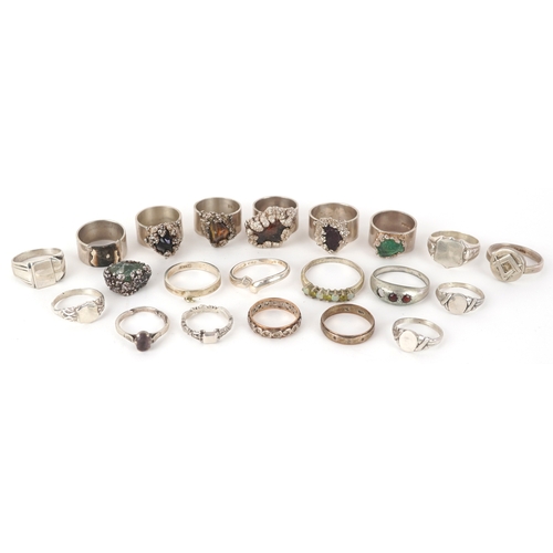 Silver and white metal rings including a 9ct gold, silver and clear ...