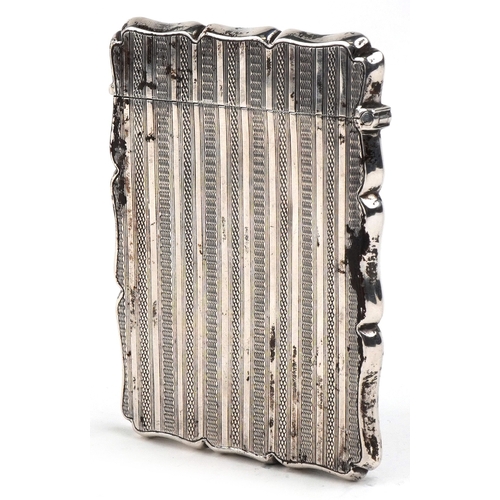 35 - William Adams Ltd., an Edwardian silver engine turned card case, Birmingham 1904, 9.7cm high, 61.5g.