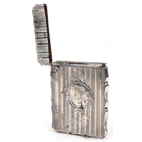 35 - William Adams Ltd., an Edwardian silver engine turned card case, Birmingham 1904, 9.7cm high, 61.5g.