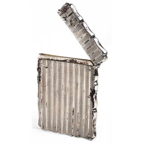35 - William Adams Ltd., an Edwardian silver engine turned card case, Birmingham 1904, 9.7cm high, 61.5g.