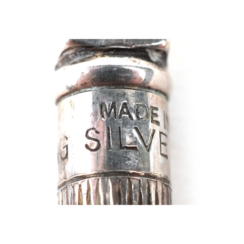 32 - Four sterling silver and enamel propelling bridge pencils housed in a fitted case, the pencils 9cm i... 