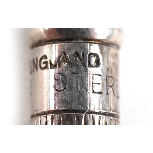 32 - Four sterling silver and enamel propelling bridge pencils housed in a fitted case, the pencils 9cm i... 