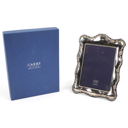 50 - Carrs, an Elizabeth II rectangular silver easel photo frame embossed with flowers, Sheffield 2007, 2... 
