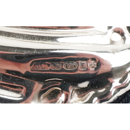 46 - J C, an Elizabeth II silver easel mirror with bevelled glass and embossed decoration, London 2000, 2... 