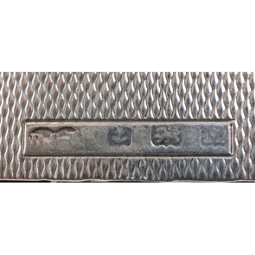 59 - An unusual Art Deco engine turned silver folding card case with gold monogram, indistinct maker, Bir... 