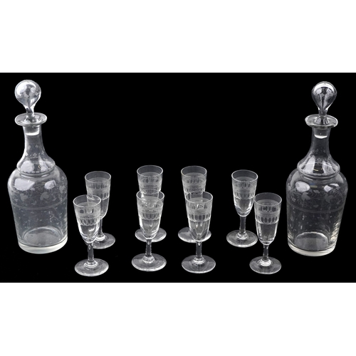 21 - A mid Victorian ebonised table top drinks cabinet with brass inlaid stringing, the hinged top reveal... 