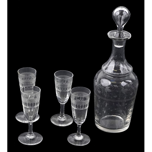 21 - A mid Victorian ebonised table top drinks cabinet with brass inlaid stringing, the hinged top reveal... 