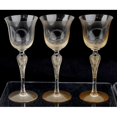 22 - A set of twelve Igor Carl Fabergé glasses with nude female frosted glass stems, by the Franklin mint... 