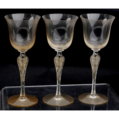 22 - A set of twelve Igor Carl Fabergé glasses with nude female frosted glass stems, by the Franklin mint... 